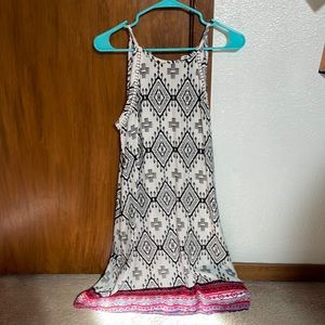 Knee length, single strap dress. XS but fits larger.